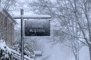 South Building Sign Covered in Snow