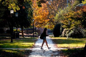 UNC-Chapel Hill campus and student walking