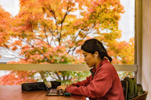 Student on laptop in the library