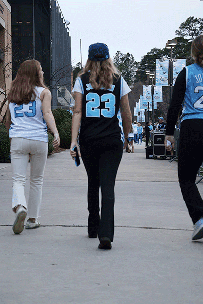 Fans head into the Dean Dome after the gates open.